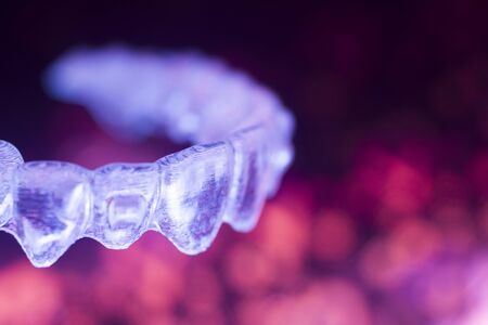 Invisible modern plastic aesthtic dentistry dental brackets teeth aligner straighteners.の写真素材