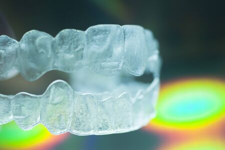 Invisible modern plastic aesthtic dentistry dental brackets teeth aligner straighteners.の写真素材