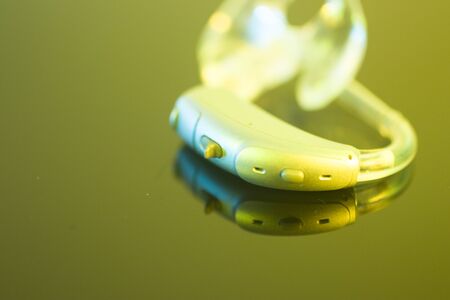 Modern digital hearing aid for deafness and deaf people.