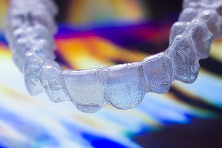 Invisible modern plastic aesthtic dentistry dental brackets teeth aligner straighteners.の写真素材