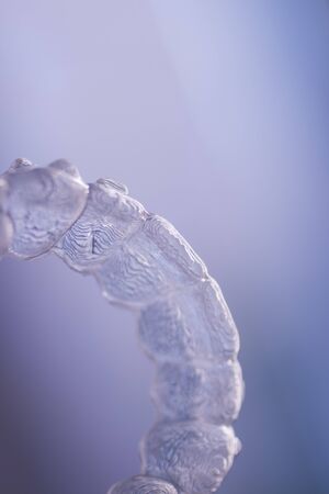 Invisible modern plastic aesthtic dentistry dental brackets teeth aligner straighteners.の写真素材