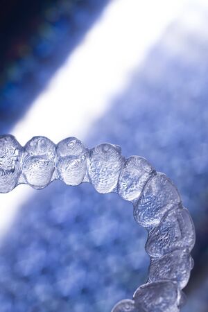 Invisible modern plastic aesthtic dentistry dental brackets teeth aligner straighteners.の写真素材
