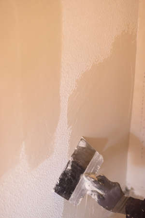 Building renovation works in appartment showing refurbishments works by builders to renovate walls.の写真素材
