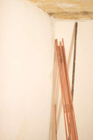 Building renovation works in appartment showing refurbishments works by builders to renovate walls.の写真素材