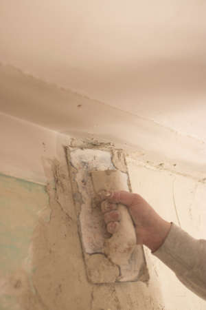 Building renovation works in appartment showing refurbishments works by builders to renovate walls.の写真素材