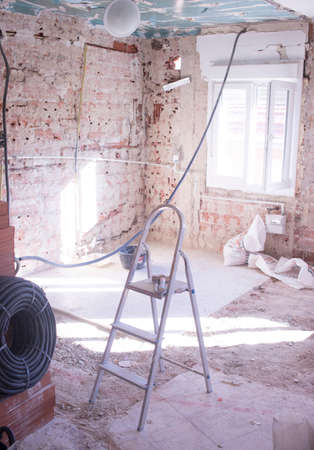 Building renovation works in appartment  renovation works in appartment showing refurbishments works by builders to renovate walls.の写真素材
