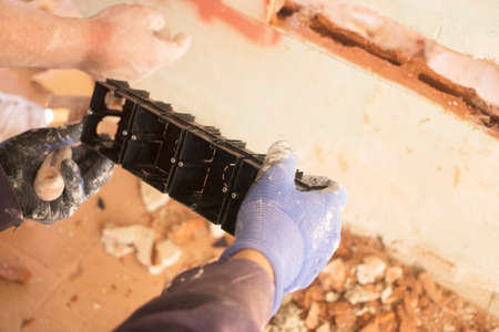 Building renovation works in appartment  renovation works in appartment showing refurbishments works by builders to renovate walls.の写真素材