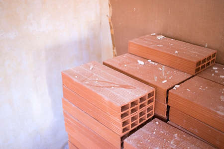 Building renovation works in appartment work by builders to renovate walls.の写真素材