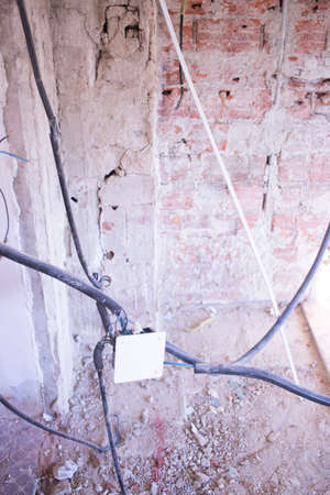Building renovation works in appartment work by builders to renovate walls.の写真素材