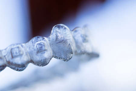 Invisible dental teeth aligners brackets used to align each tooth in cosmetic dentistry for...