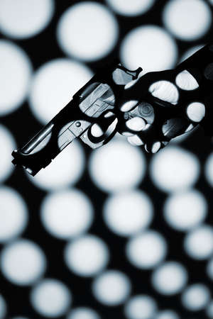 Detective male spy holding pistol gun crime thriller book cover design photo.の写真素材