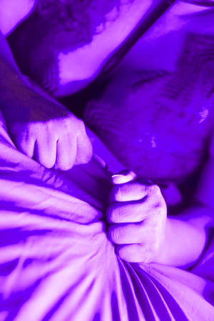 Sexy erotic lady in lingerie underwear tih big breasts on bed.の写真素材