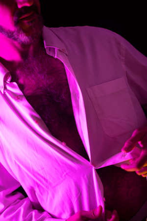 Attractive, elegant, sexy young man in erotic sensual book cover design photo.