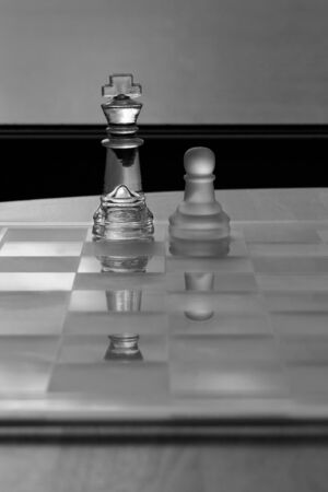 King, Pawn, Chess - Business Concept Series - Mentor, Coach, Guru, Business support, success の写真素材
