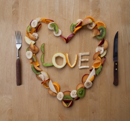 Fresh sliced fruit, heart shaped for Valentines Day  の写真素材