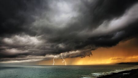 Lightning and Thunderstorm Over Sea  - panoramicの写真素材