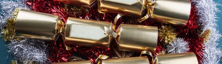 Christmas Crackers with blank labels - red, gold, silver and green - panoramaの写真素材