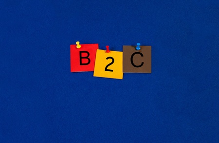 B2C - Business and PR terms sign series, tiles and letters on noticeboard with pins.の写真素材
