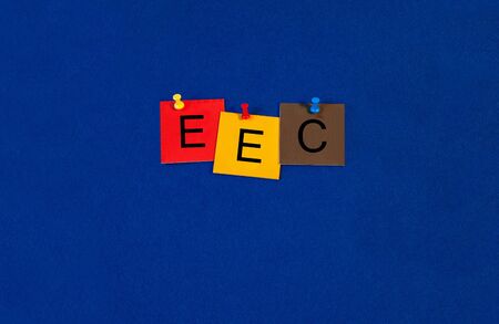 E.E.C. - Business and PR terms sign series, tiles and letters on noticeboard with pins.の写真素材