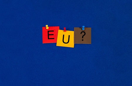 EU - Business and PR terms sign series, tiles and letters on noticeboard with pins.の写真素材