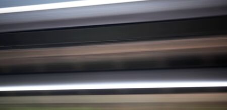 Blurred motion background, panorama wall abstract of colorful stripes, in black, gray, white and green.の写真素材
