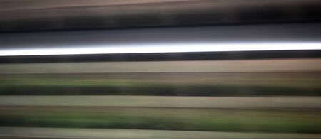 Blurred motion background, panorama wall abstract of colorful stripes, in black, gray, white and green.の写真素材