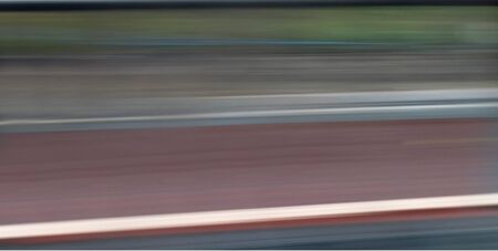 Blurred motion background, panorama wall abstract of horizontal, colorful stripes, in black, gray, pink, white and green.の写真素材