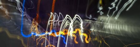 Crazy lights background texture - blurred, random and chaotic, abstract orange and blue light...