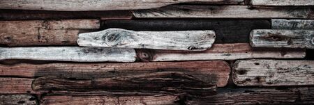 Driftwood -  imaginative background texture, with worn brown paint and rugged wood grain - panorama ...