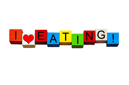 I Love Eating - words / sign / design - for dining, diners, cafes, restaurants, in bold letters, isolated on white background.の写真素材