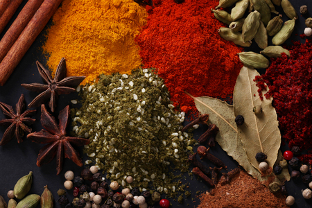 Spices scattered on the tableの写真素材