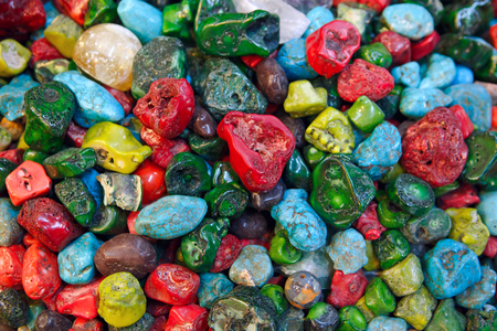 The red and green coralls, turquoise, lapis lazuli and other jewelry stones are the favorite tourist souvenirs in Eastern countries, Jerusalem, Israel.の写真素材