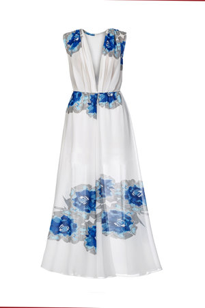 Summer silk white dress with blue flowers on a white background. Studio shotの写真素材