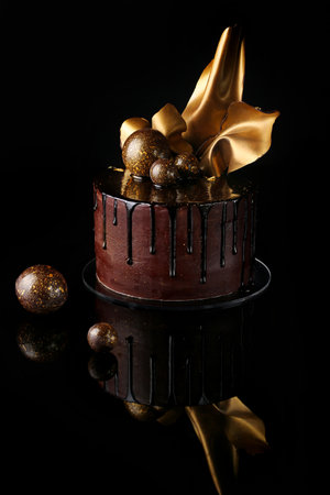 Fancy chocolate cake, isolated, black background, studioの写真素材