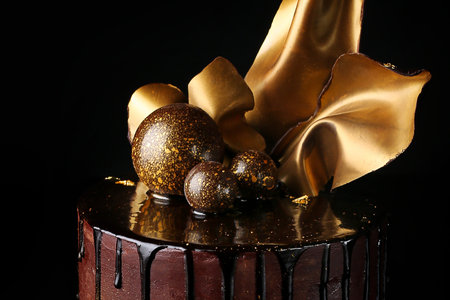 Fancy chocolate cake, isolated, black background, studioの写真素材