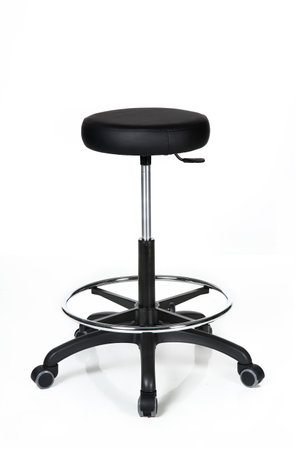 Shiny metal and black leather stool, isolated on whiteの写真素材