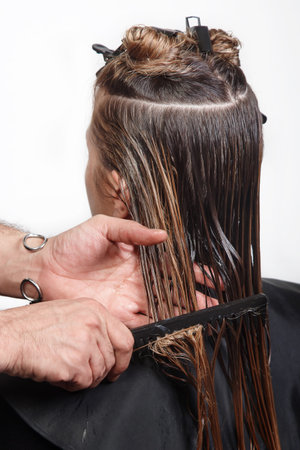 Closeup of the client`s hair in the Barber shop, beauty salon, Studio. Mask, care, Spa beauty salon, barber shop, hair salon,の写真素材