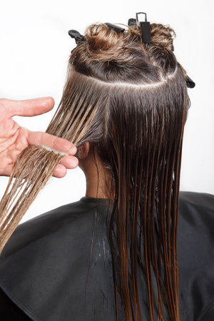 Closeup of the client`s hair in the Barber shop, beauty salon, Studio. Mask, care, Spa beauty salon, barber shop, hair salon,の写真素材