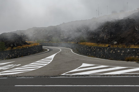 Mountain road on Mount Etna volcano in Sicily, Italyの写真素材