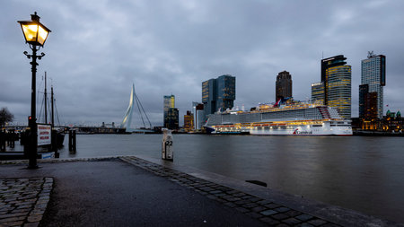 Rotterdam, Netherlands - 2020-12-23: Cruise vessel Mardi Gras moored at Rotterdam cruise terminal at dusk during maiden callのeditorial素材