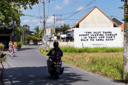 Bali, Indonesia - 04-30-2023: Canggu advertisement on a building by the roadのeditorial素材