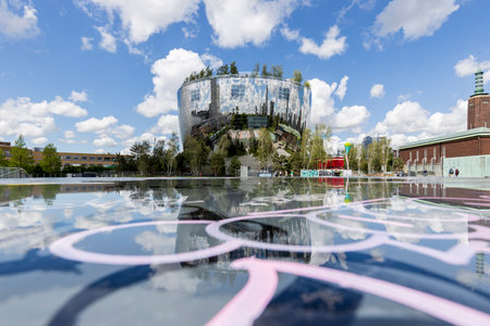 Rotterdam, the Netherlands - 2022-05-24: The Depot of museum Boijmans van Beuningen famous architecture in Rotterdam reflected in a puddleのeditorial素材