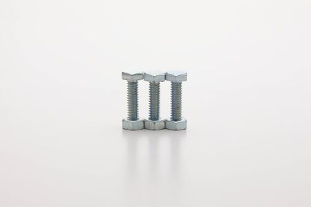 Chrome bolts aligned, isolated on white