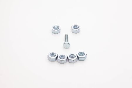 Chrome bolts   nuts aligned, isolated on white