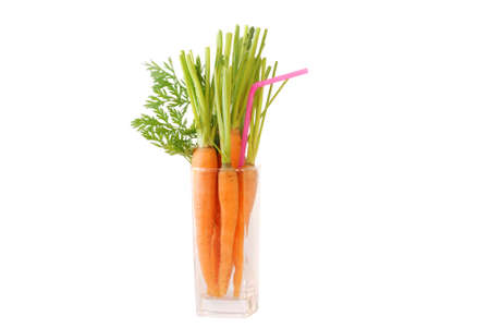 Young fresh carrots in  glassの写真素材