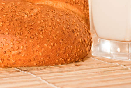 Bread with milk arranged on table close upの写真素材