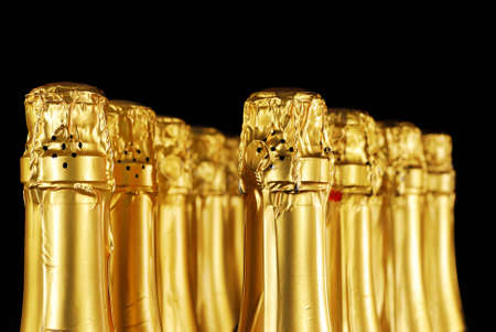 Champagne bottles in gold foil