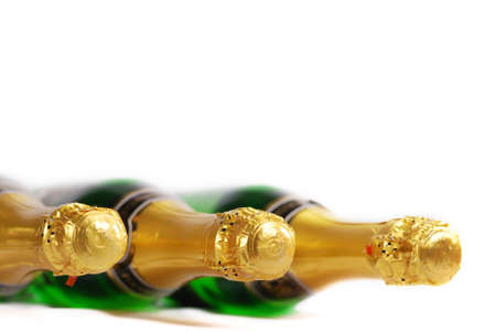 Champagne bottles isolated on white backgroundの写真素材