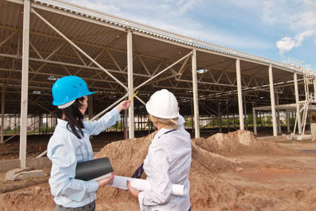 Two engineers at  construction site 