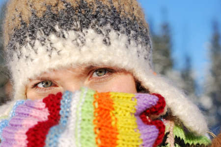 Woman  portrait with  winter background out of focusの写真素材